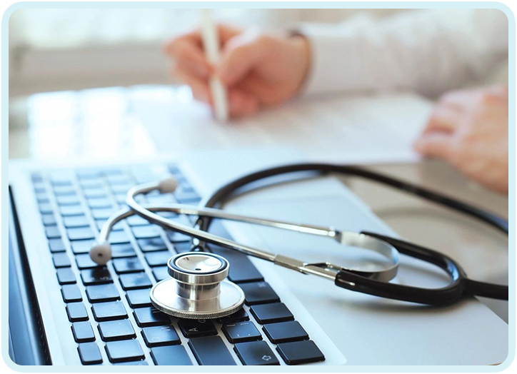 A stethoscope sitting on top of a keyboard.